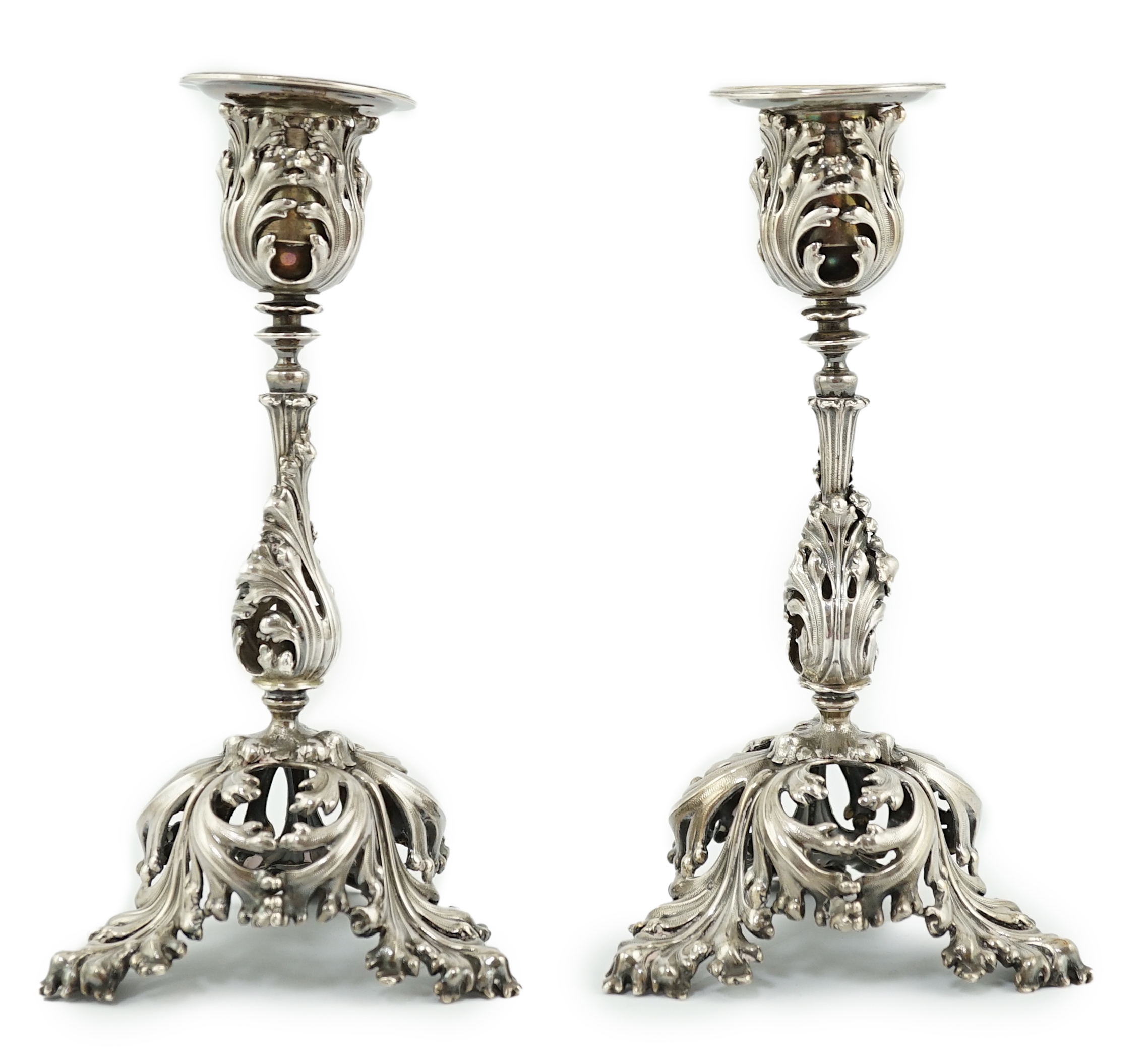 A pair of French pierced 950 standard silver candlesticks